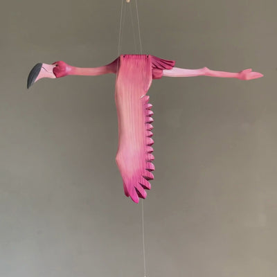 Video of hand-carved flamingo in flight